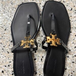 Tory Burch Black Sandals with Gold Accent